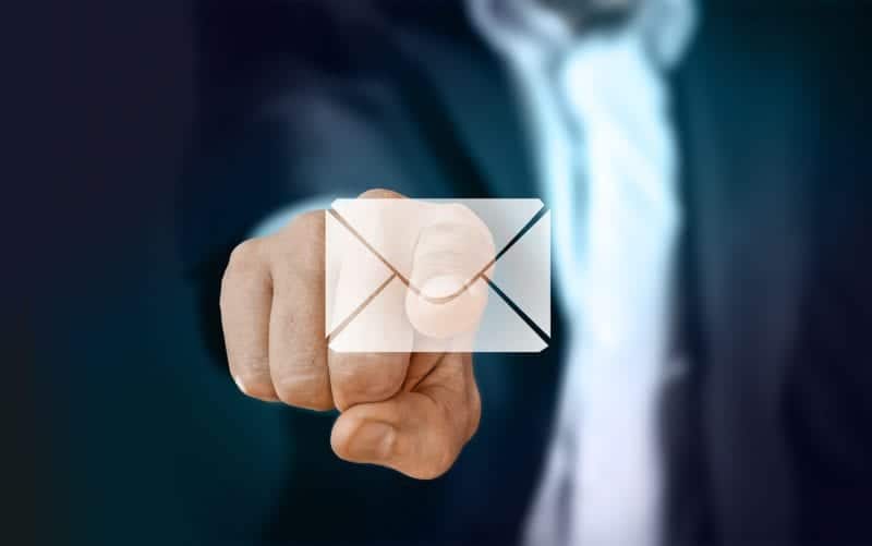 Man pointing to email icon