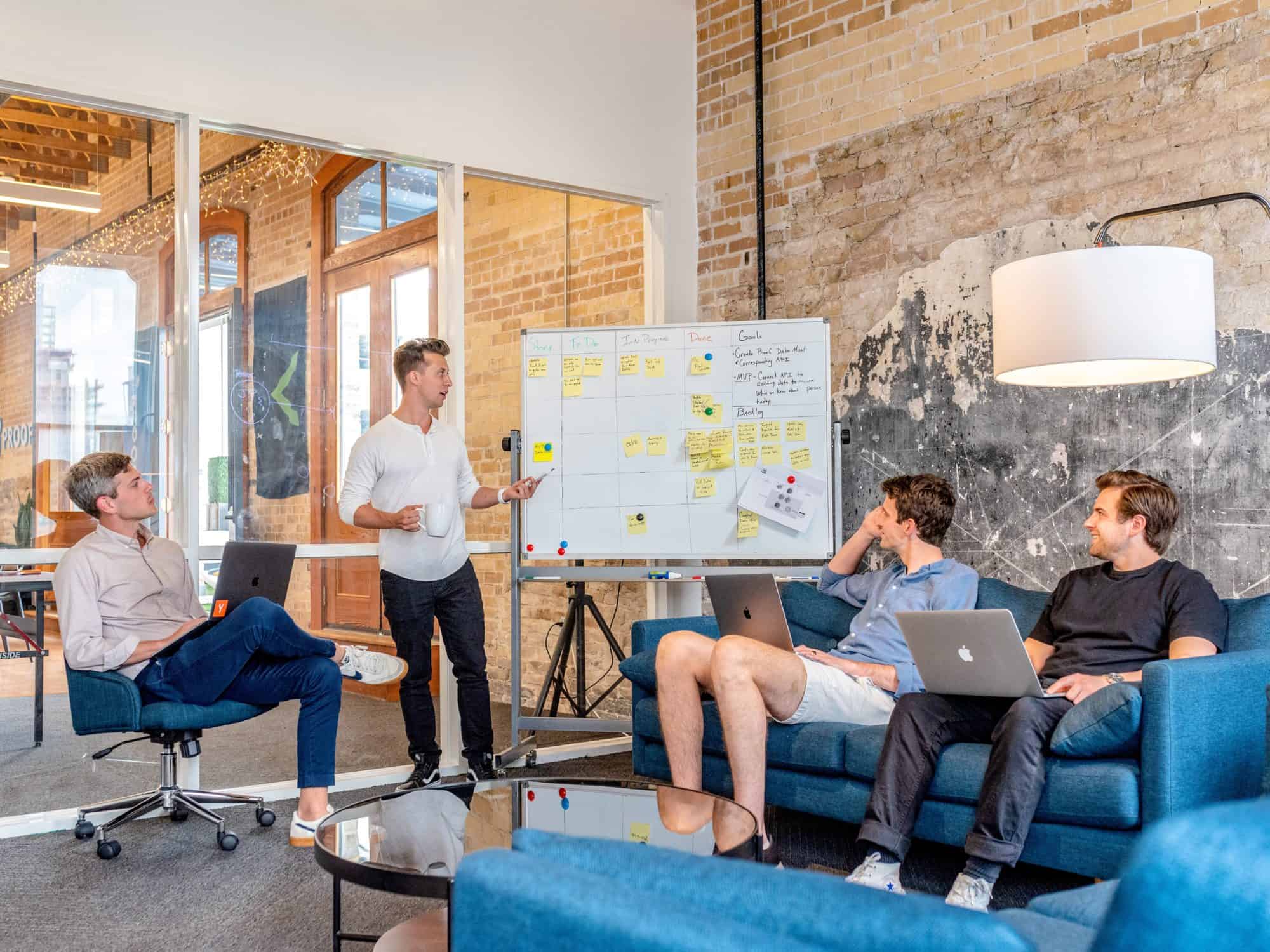 Four men in business meeting
